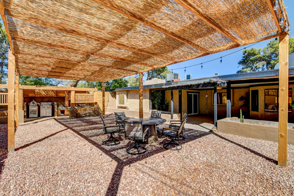 Zen Haven villa in Vegas has a beautiful shaded BBQ area in the backyard, with outdoor table and seating, and space for small events.